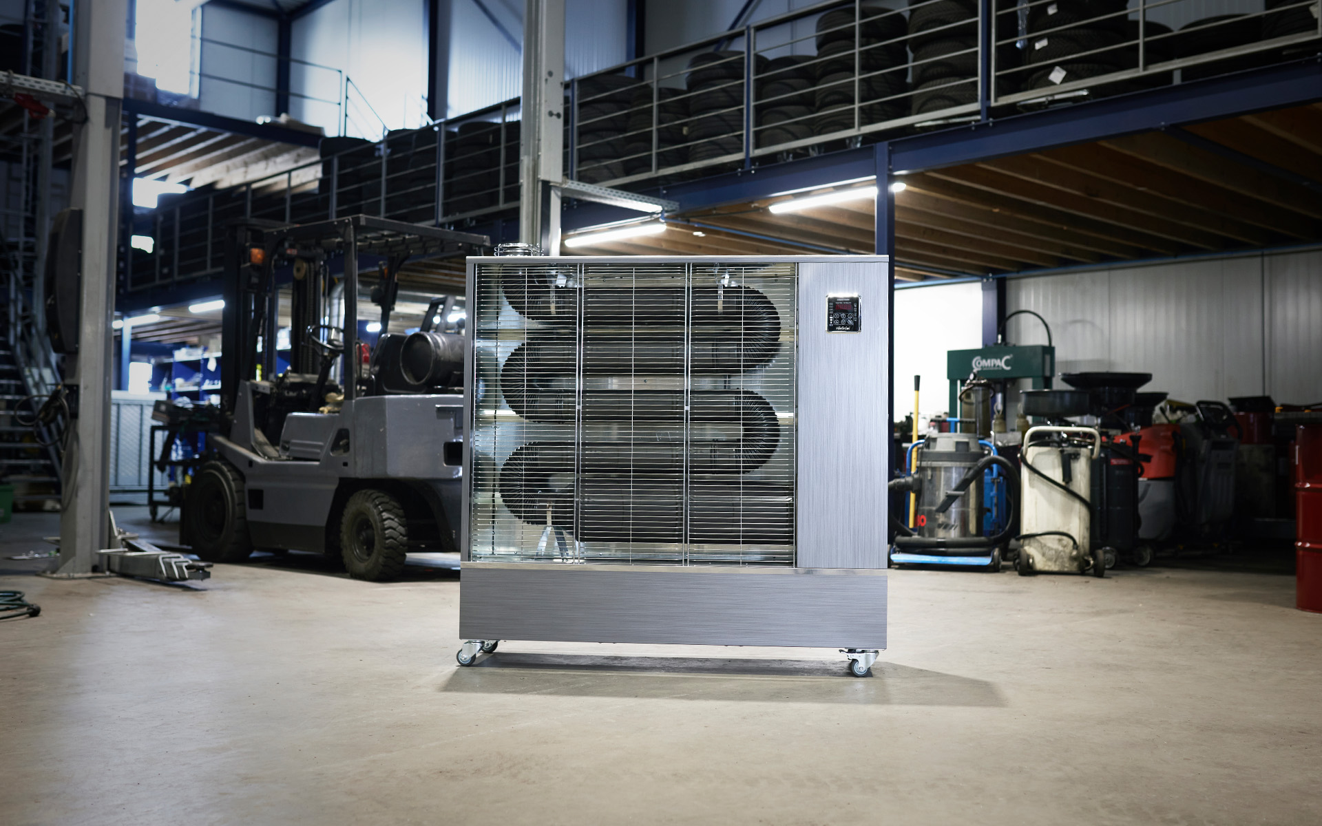 Toyotomi Infrared Heater TIB-22 positioned in a garage, providing efficient heating for workshop or storage spaces.