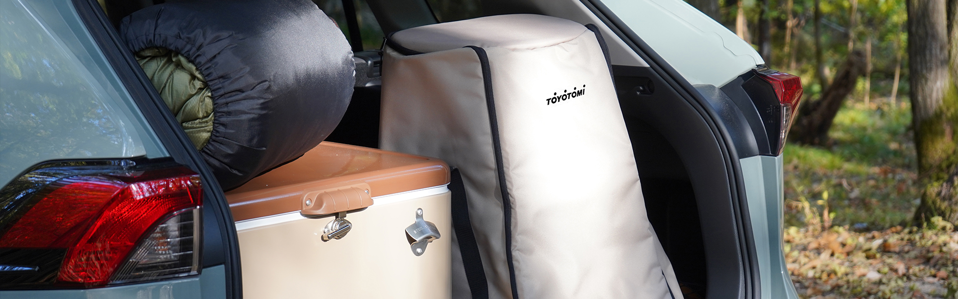 Toyotomi Europe round type paraffin heater carrying bag in the trunk of a car used to transport the heater safely and easily.