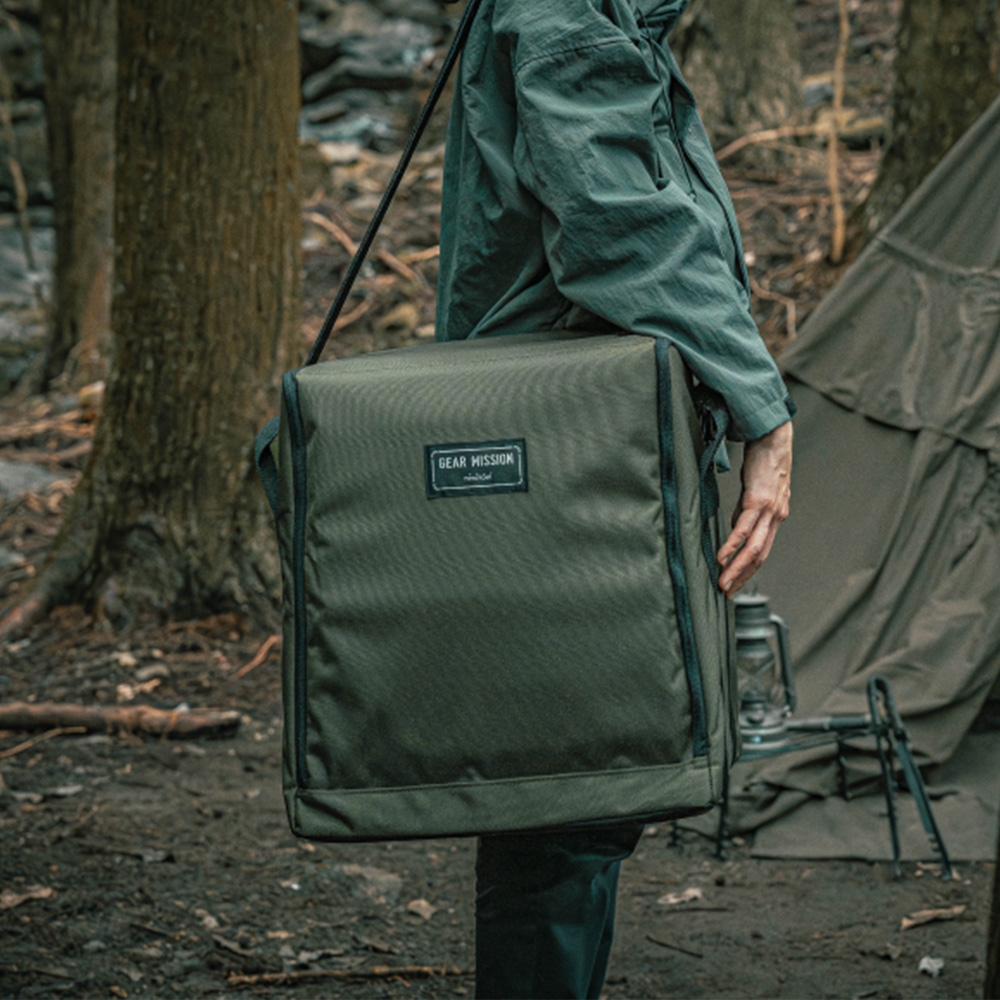 Toyotomi GEAR MISSION carrying back being used to carry a Toyotomi GEAR MISSION paraffin heater to a camp site.