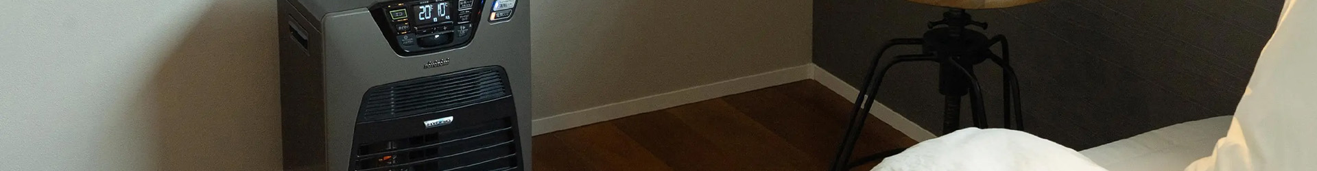 Toyotomi Laser (fan) heater in a bedroom showing the Zibro heater heating up the bedroom next to a bed