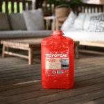Red Toyotomi Plus heating fluid container for outdoor use.