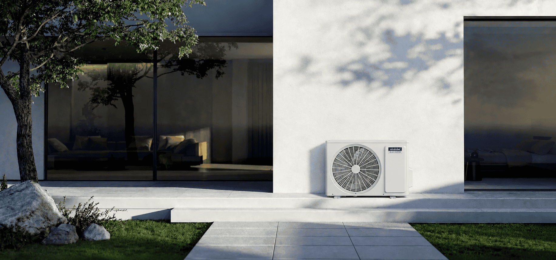 Toyotomi outdoor air conditioner unit for a split air conditoner in front of a modern home with morning sun on it